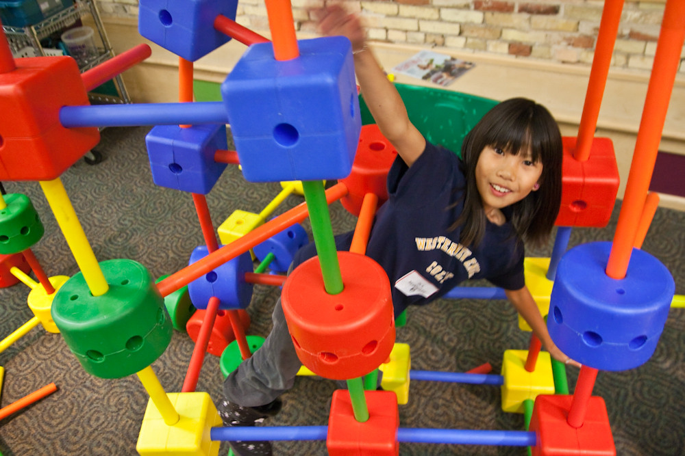 girl with tinker toys